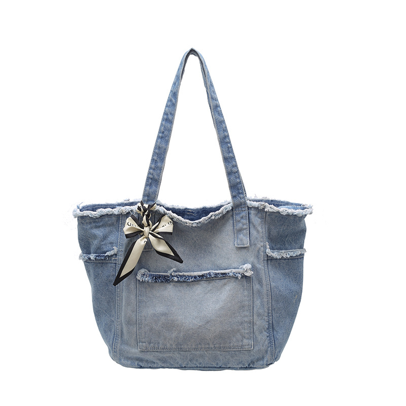 A fashionable new large bag with a Korean style, simple and trendy design, and a unique single-shoulder hand-carry tote bag for commuting and casual wear Item Picture