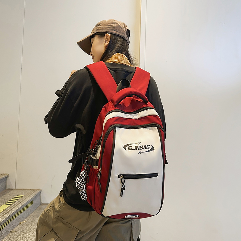 Korean version of Instagram trendy couple backpacks for college students, high school girls with contrasting colors, and multi-layered backpacks for teenagers and students full figure