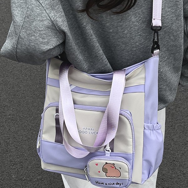 2025 New Korean version large-capacity junior high school girl heart student schoolbag, casual and simple travel tutorial bag for girls, crossbody bag full figure