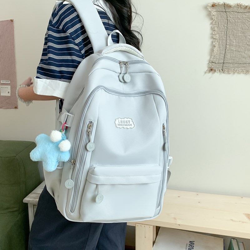 A new, simple backpack for girls, suitable for college students, high school students, and junior high school students, with a large capacity full figure