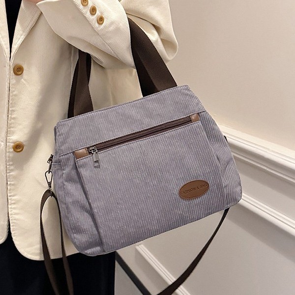 Retro and simple large-capacity corduroy fabric bag, women's hand-held shoulder crossbody bag, multi-compartment commuting bag, multi-functional bag full figure