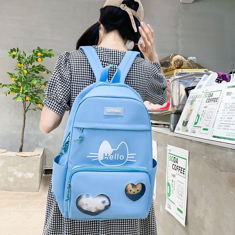 Wholesale of new large-capacity casual canvas backpacks for female middle school students in a Korean style with a fresh and cute cartoon design details Picture