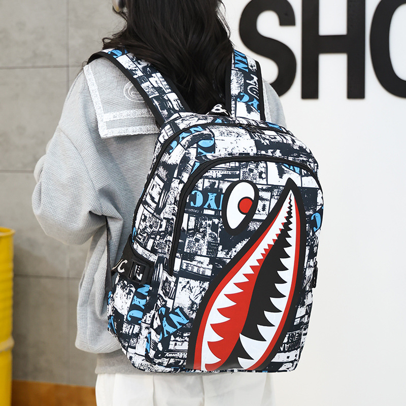 Cross-border exclusive schoolbag for primary school students, shark personalized pattern printed, large-capacity, lightweight and simple backpack, backpack for men Application Scenario