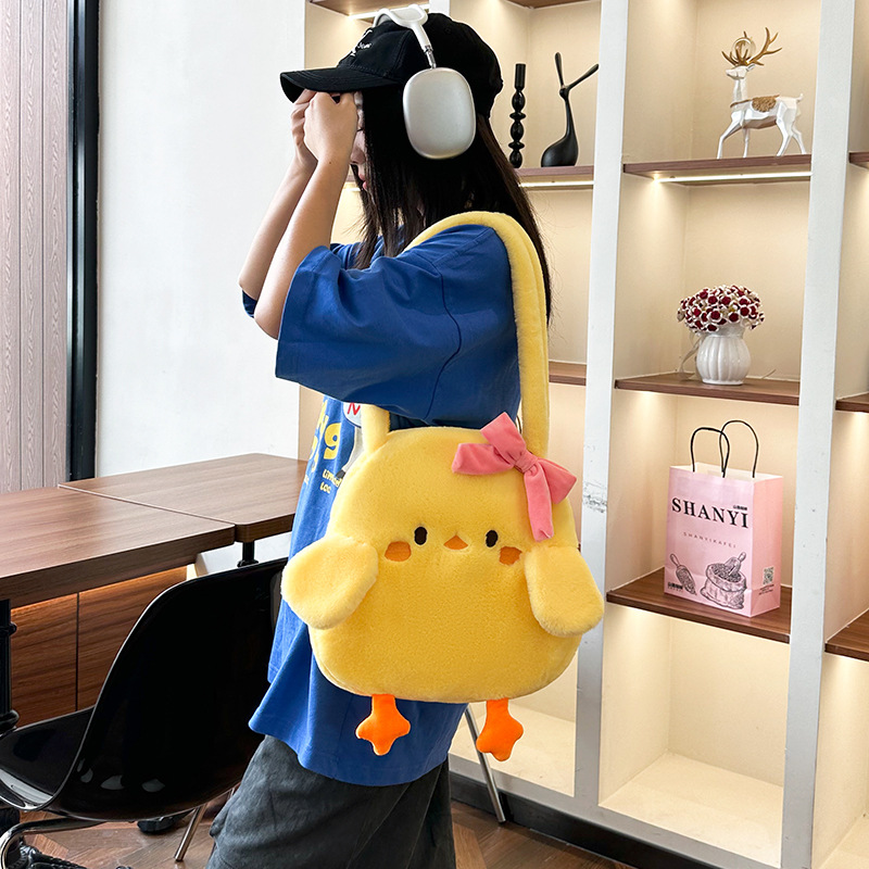 Cartoonson-style ins Hong Kong-style little yellow duck bow single-shoulder bag 2024 new style, versatile and girlish plush hand-held Specification drawing