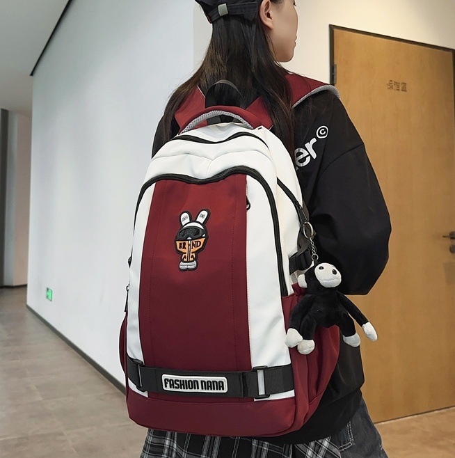 Personalized cartoon schoolbags for girls, trendy brand backpacks for junior and senior high school students, color-blocking large-capacity travel backpacks for college students full figure