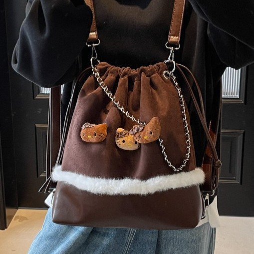 Multi-functional KT cat solid color crossbody bag, fabric bag, autumn and winter tote bag, Korean style versatile, Japanese style drawstring opening, niche backpack Application Scenario