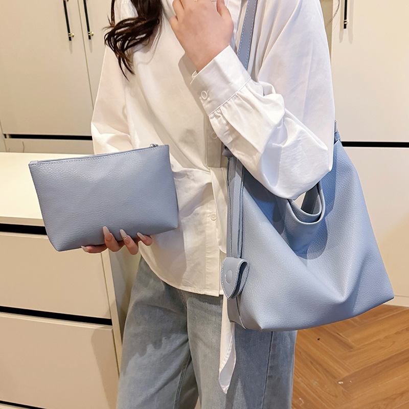 Korean large-capacity bucket bag for women 2025 new style, high-end soft leather letter single-shoulder bag, fashionable commuting crossbody bag details Picture