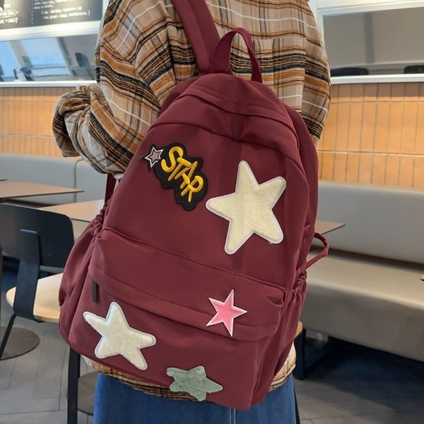 New casual backpack for junior high school students, large-capacity Korean-style schoolbag, fashionable and cute star academy style backpack details Picture