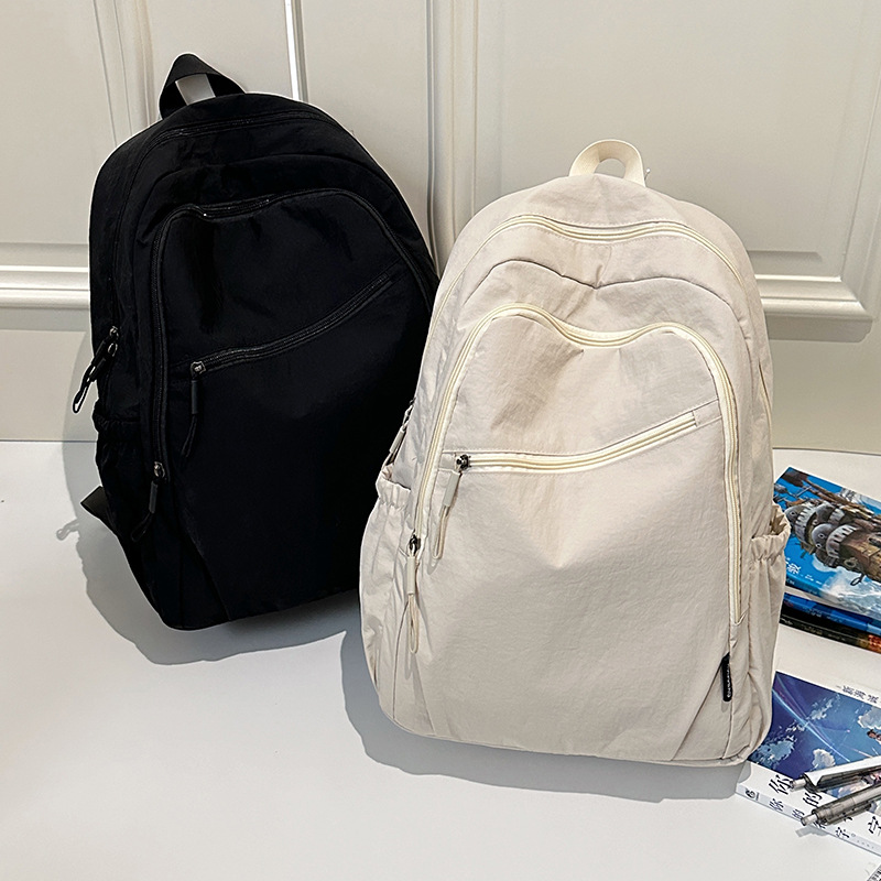 New 2025 cross-border large-capacity student backpack, trendy outdoor travel and casual computer backpack for Japan and South Korea full figure