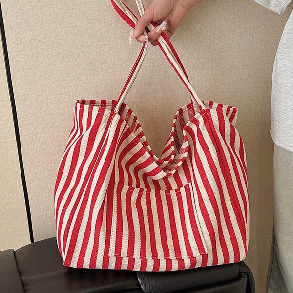 A new large-capacity Korean-style simple striped shopping bag, a fresh and artistic canvas bag, a versatile bag for women in spring and summer details Picture