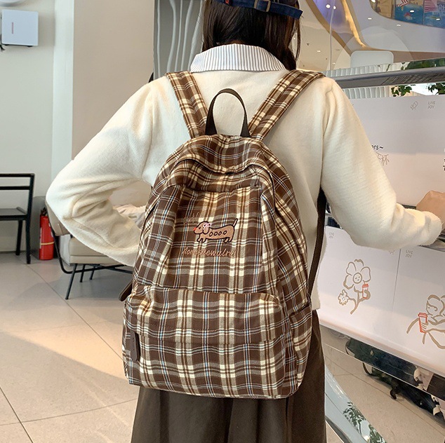 Korean-style checkered backpack for female college students, a niche design backpack with high appearance standards, cute and versatile, fashionable girls' backpacks full figure