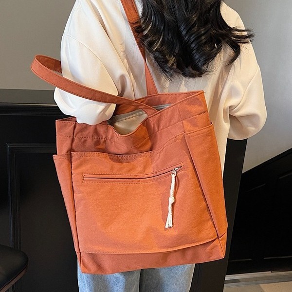 A new large-capacity business commuting fashion style, a large-capacity soft-faced solid color horizontal square Oxford fabric casual shoulder bag details Picture