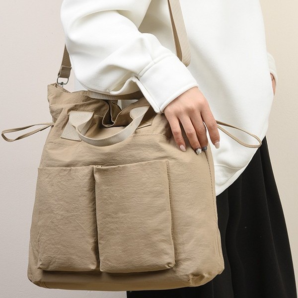 New 2025 Spring/Summer handbags: Women's commuter bag, simple school style, student single-shoulder bag, solid color crossbody bag full figure