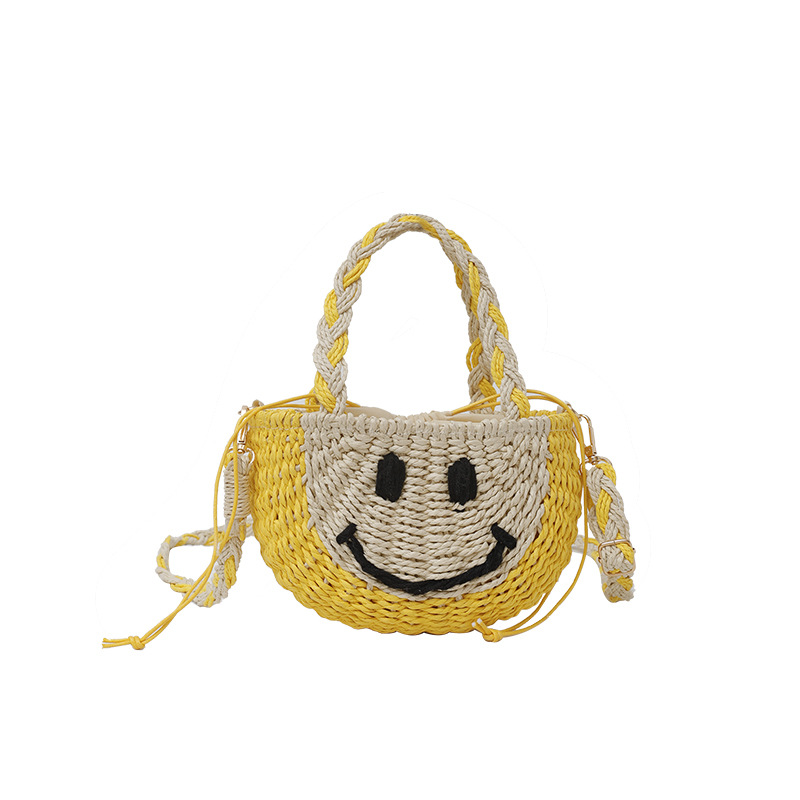 Cute smiling face hand-held straw woven bag, new and fresh bucket straw woven bag, vacation beach bag, versatile women's bag Item Picture