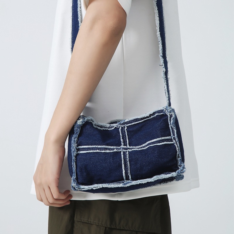 A new Japanese-style solid-color denim canvas bag for women in 2023, a casual mini mobile phone bag with washable, aged edges and a small backpack full figure