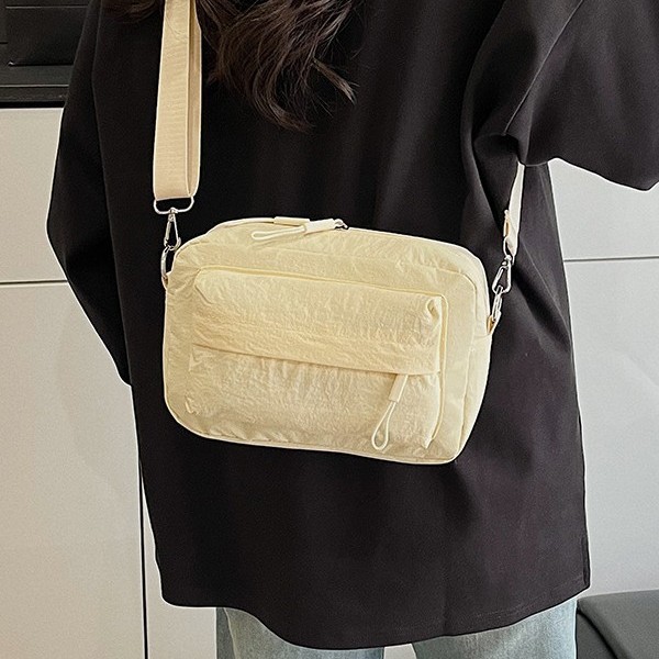 Korean-style simple crossbody bag for women's commuting, versatile nylon fabric women's bag, niche outdoor casual crossbody bag for women in solid colors details Picture