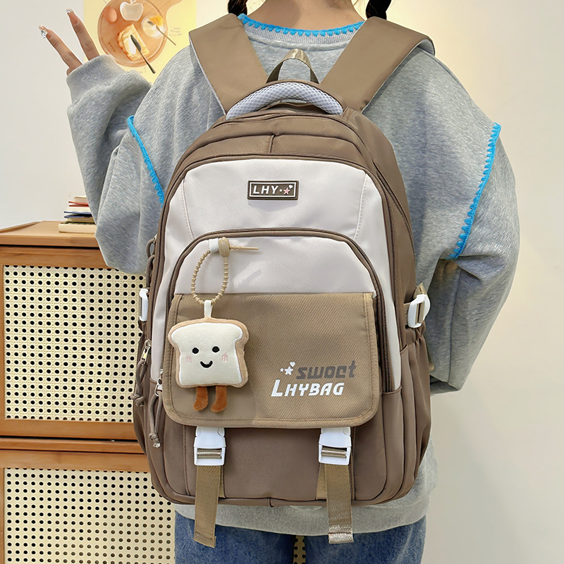 New breathable, weight-reducing and spine-protecting junior high school backpack for girls, cute. Large-capacity candy-colored backpacks for grades three to six details Picture