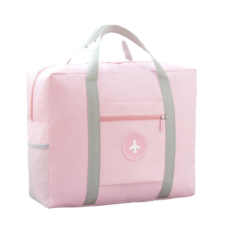 A large-capacity Japanese-style travel solid-color, fresh and simple round-label handle bag, folding travel clothing storage bag, and cotton quilt bag Item Picture