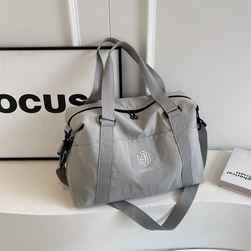 Fashionable, lightweight and large-capacity travel bag, suitable for both men and women, outdoor luggage bag, hand-held camping sports and fitness bag details Picture
