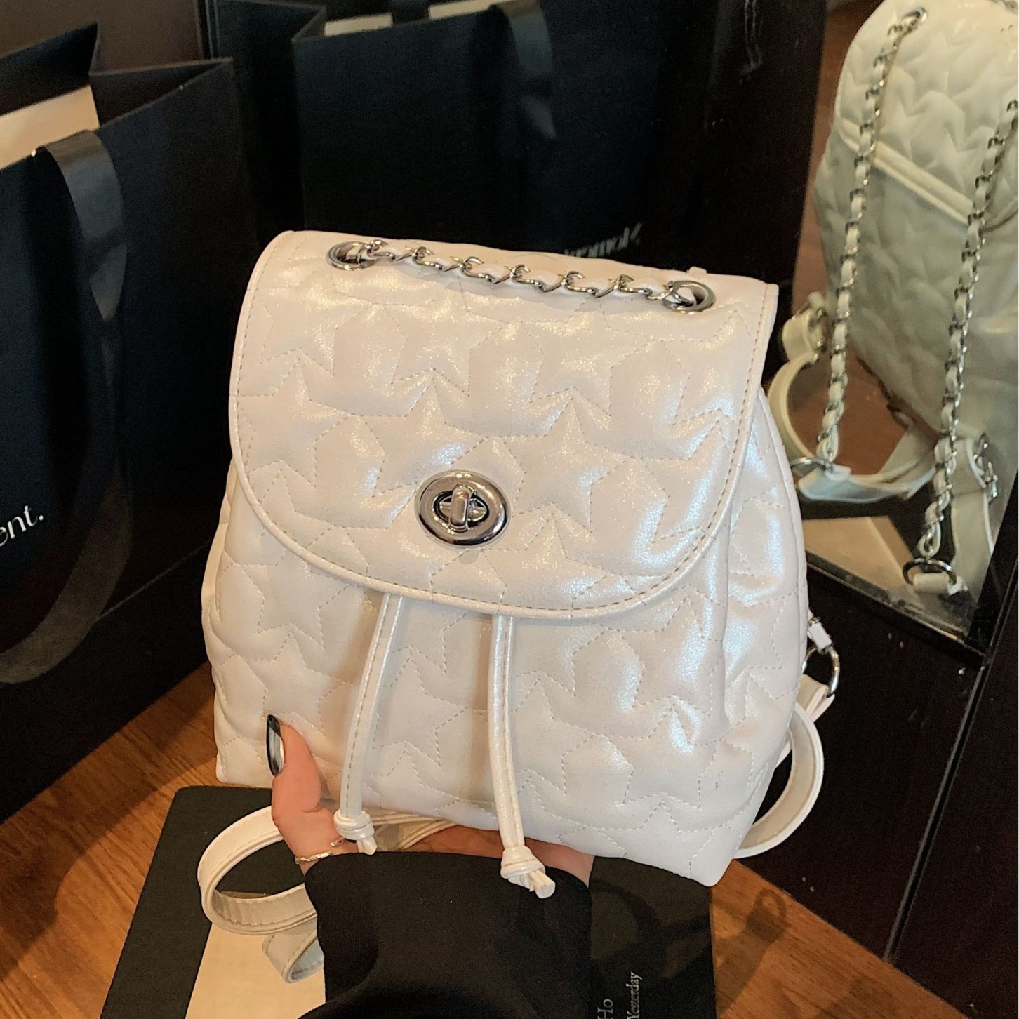 The 2025 new Korean-style chanel-embroidered small backpack is a high-end, fashionable, casual and versatile chain backpack for commuting full figure