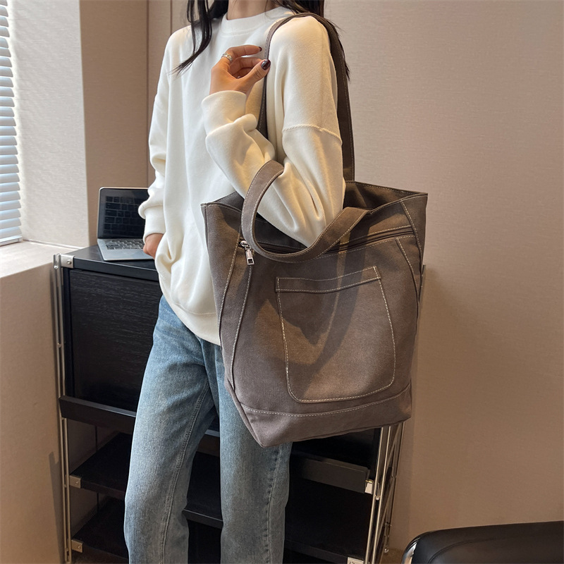 New canvas bag, simple and casual solid color women's bag 2025, large-capacity tote bag, campus student make-up class bag details Picture