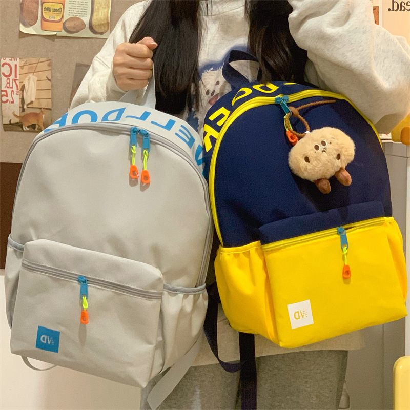 New fashionable backpack for female college students, 2025 Korean version, color-blocking backpack for girls and children, junior high school and senior high school students full figure