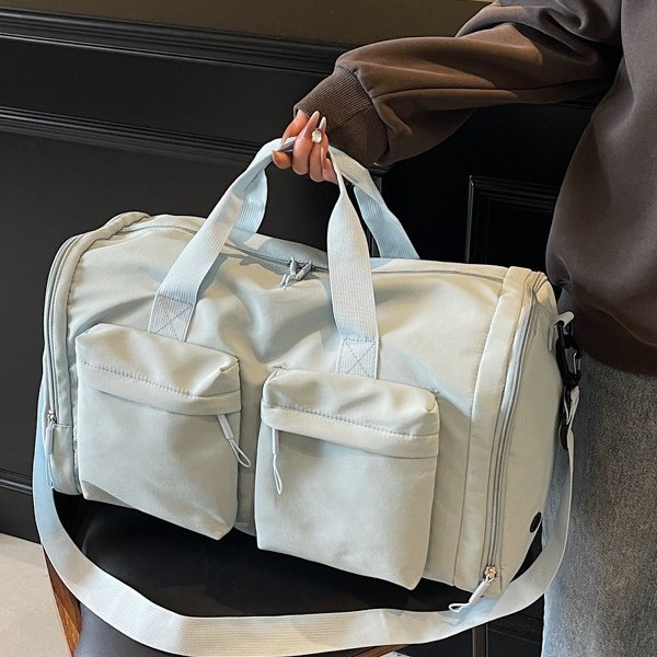 Large-capacity hand-held travel bags for men and women, long and short trips, business trips, sports bags, storage luggage bags, shoulder bags Application Scenario
