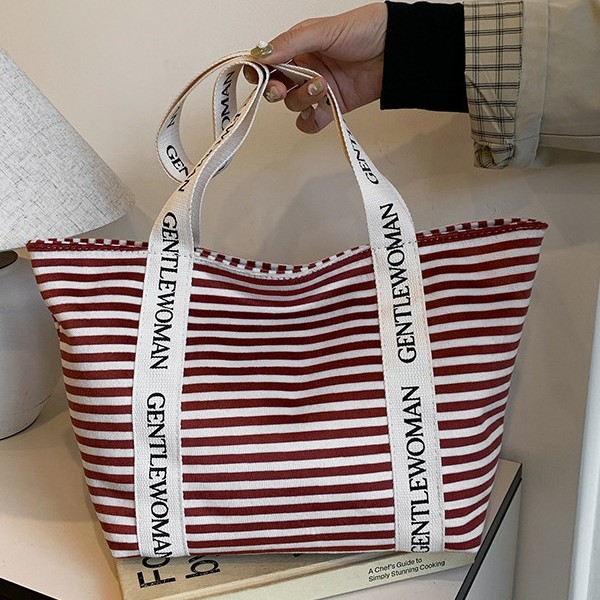 New striped large-capacity handbag, versatile new tote bag, portable handbag for going out, autumn and winter bag full figure