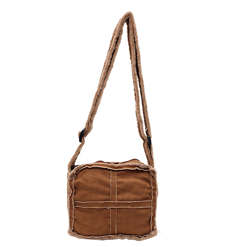 The new design of the laid-back canvas small bag is a retro, aged and fringed student single-shoulder crossbody bag that catches the eye Item Picture