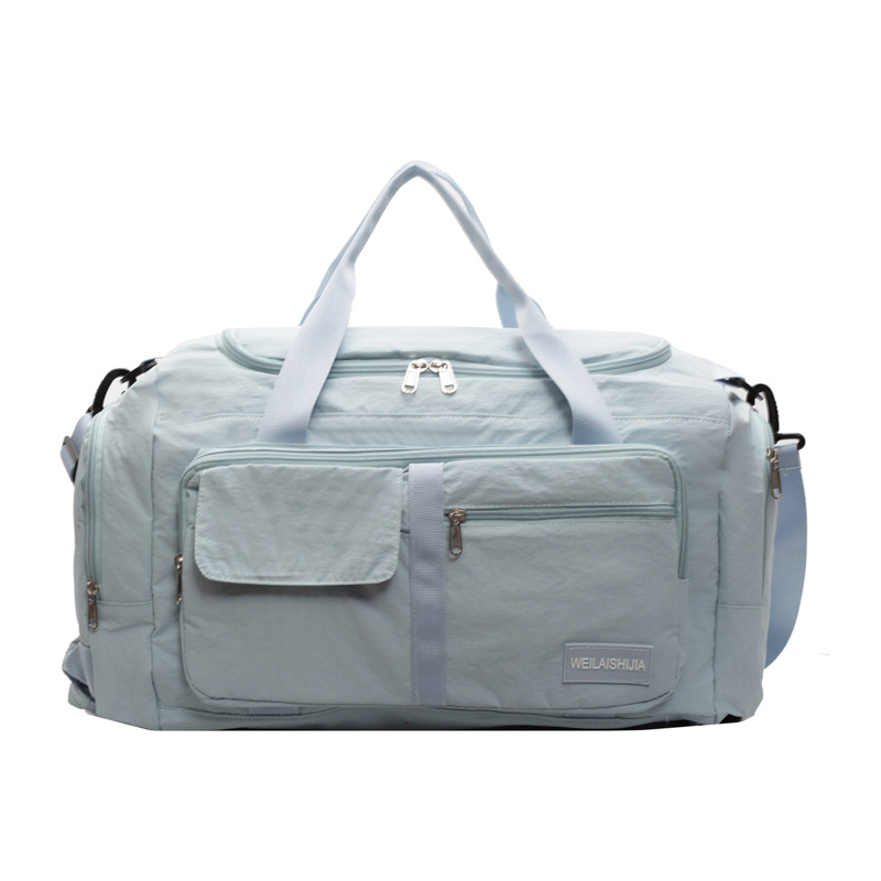 Foldable hand-held travel bag, lightweight and multi-functional double-back sports and fitness bag, dry and wet separation case, trolley luggage bag Item Picture