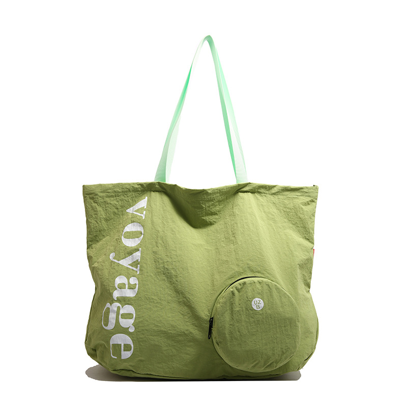 Korean-style large-capacity canvas tote bag with a relaxed feel, a new model handbag for college students' commuting to and from school in 2025 Item Picture
