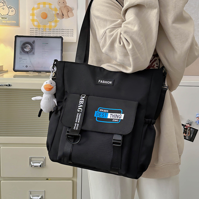 A large-capacity tote bag for college students commuting to class, a 2024 new college-style crossbody single-shoulder bag, and a make-up class bag for men full figure