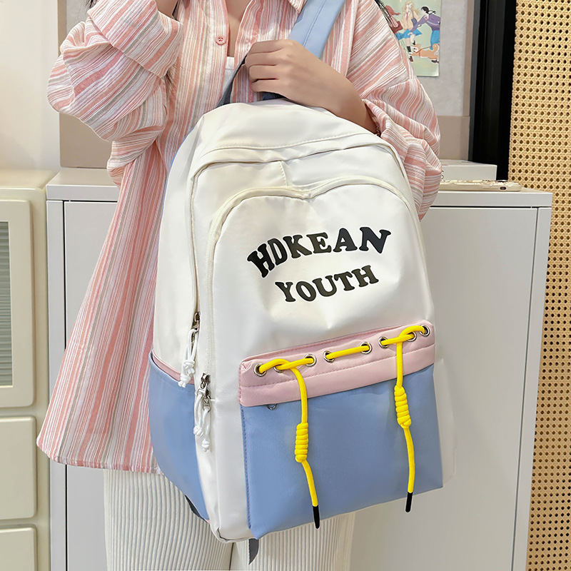 Casual couple backpack, simple and large-capacity student backpack, Korean style, fashionable and versatile, high appearance level college student schoolbag details Picture