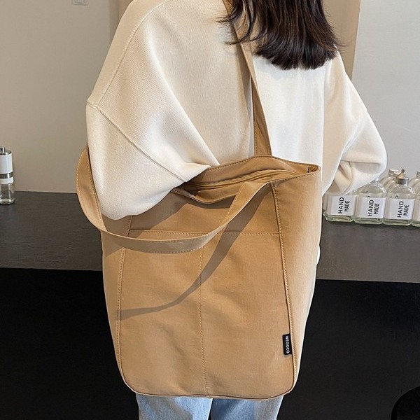Fashionable new fabric bag, casual single-shoulder bag, versatile women's bag, design sense, large capacity for commuting, tote solid color large bag details Picture