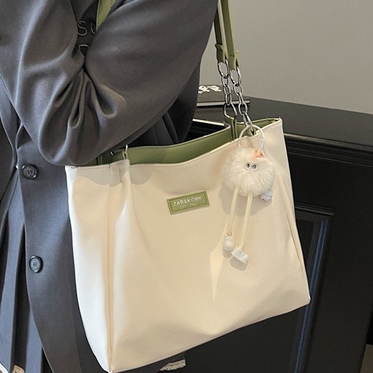 The popular Korean version of the tote bag for college students in 2025, a new trendy single-shoulder bag with a large capacity and a fashionable commuting bag full figure