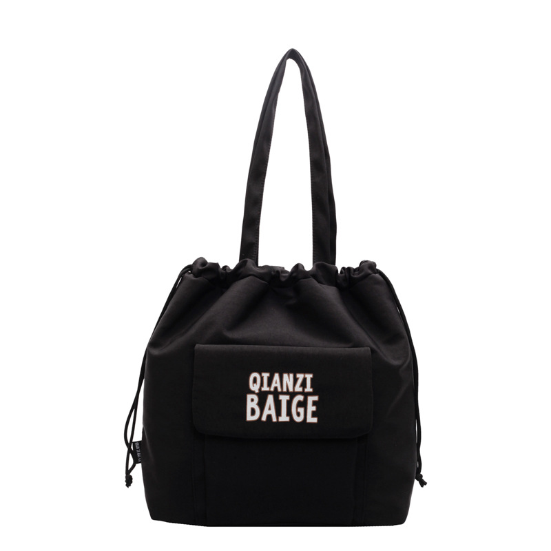 New women's 2024 large-capacity single-shoulder bag, a trendy brand fashion drawstring pocket, solid color casual shopping bag Item Picture