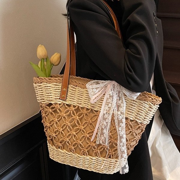 Cross-border laid-back style hand-held straw woven bag, female artistic forest-style woven large-capacity bag, casual hollowed-out tote bag details Picture
