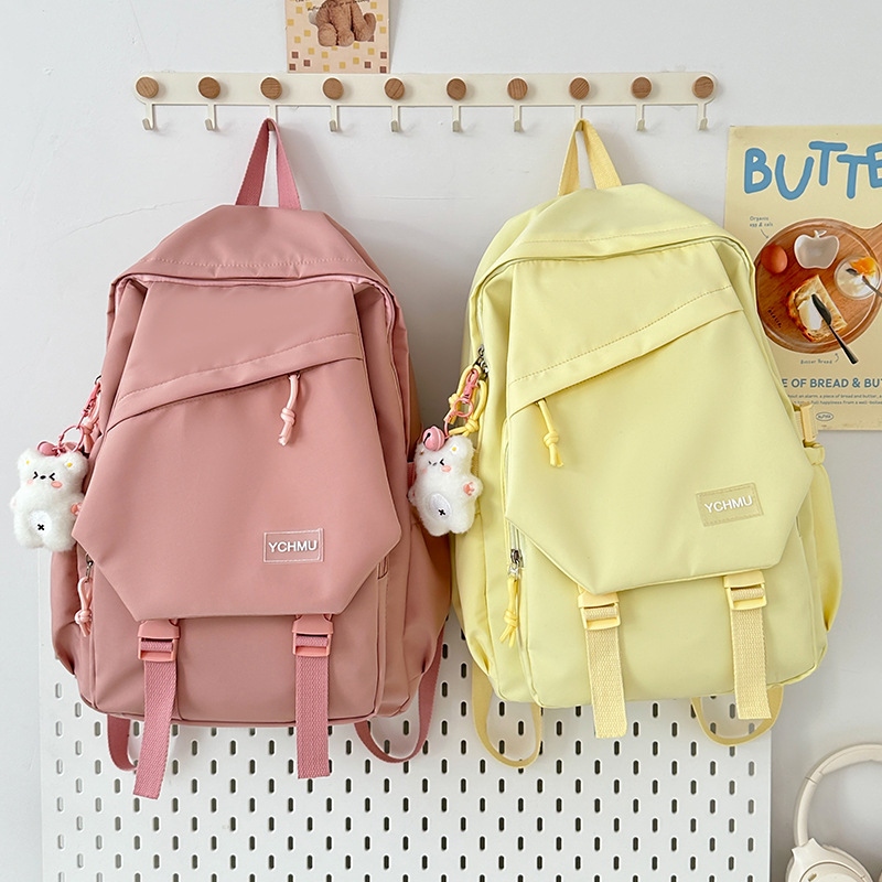 New 2025 backpack for college students, versatile campus backpack, simple Korean version for junior high school students, large capacity full figure