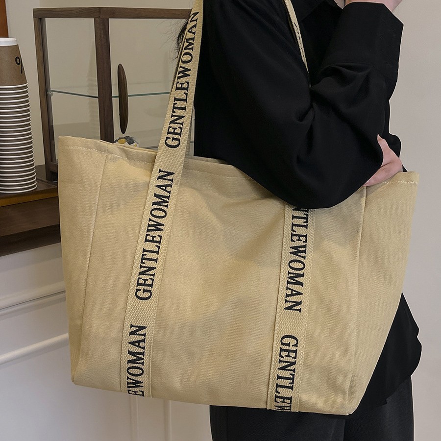 The 2025 new canvas bag for women is versatile, fashionable and of high quality. It is a large-capacity single-shoulder bag for commuting and can be carried for shopping Specification drawing