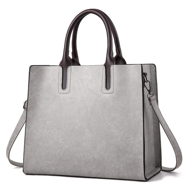 Factory direct sales and wholesale of 204 new PU hand-held large bags, retro women's bags, crossbody bags, single-shoulder bags, and foreign trade tote bags Item Picture