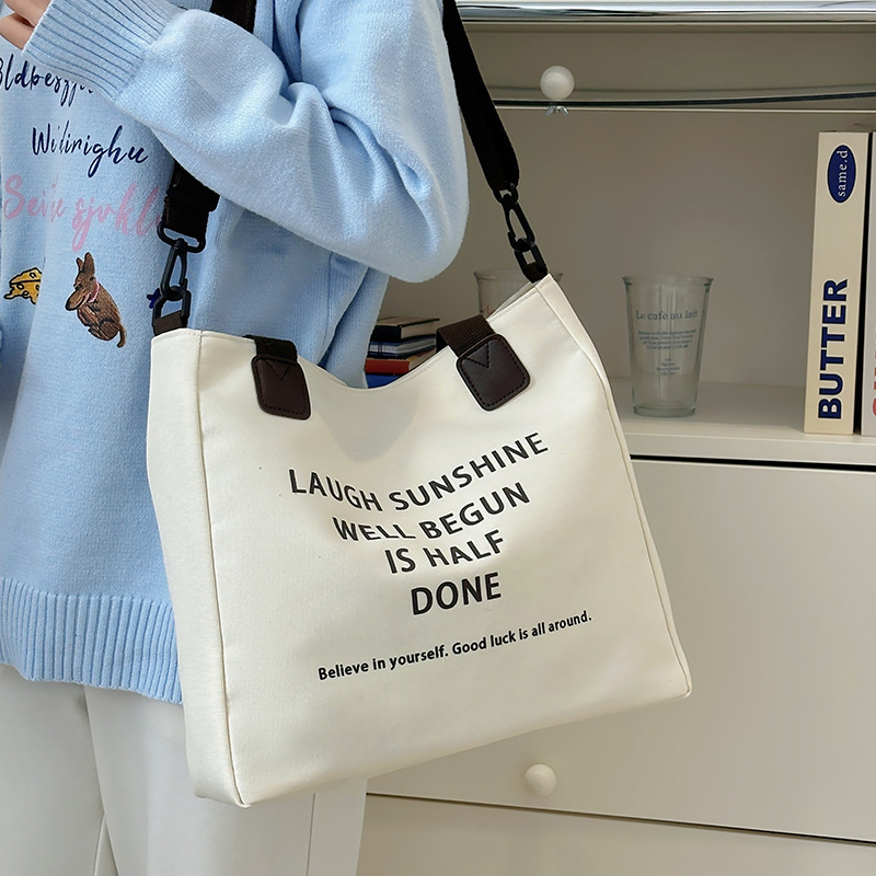 Korean version hand-held tote bag with large capacity, new printed underarm single-shoulder bag from Japan and South Korea, student casual commuting crossbody bag Application Scenario