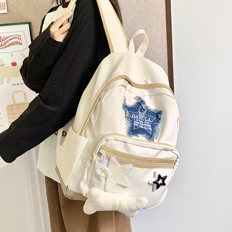 This Japanese-style Instagram cute girl backpack is lightweight, versatile and has a large capacity. It's a lightweight backpack for college students full figure