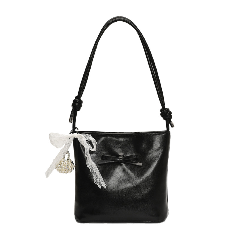Korean style fashion niche bow hand-held bucket bag for women 2025 new summer, high-end and versatile single-shoulder underarm bag Item Picture