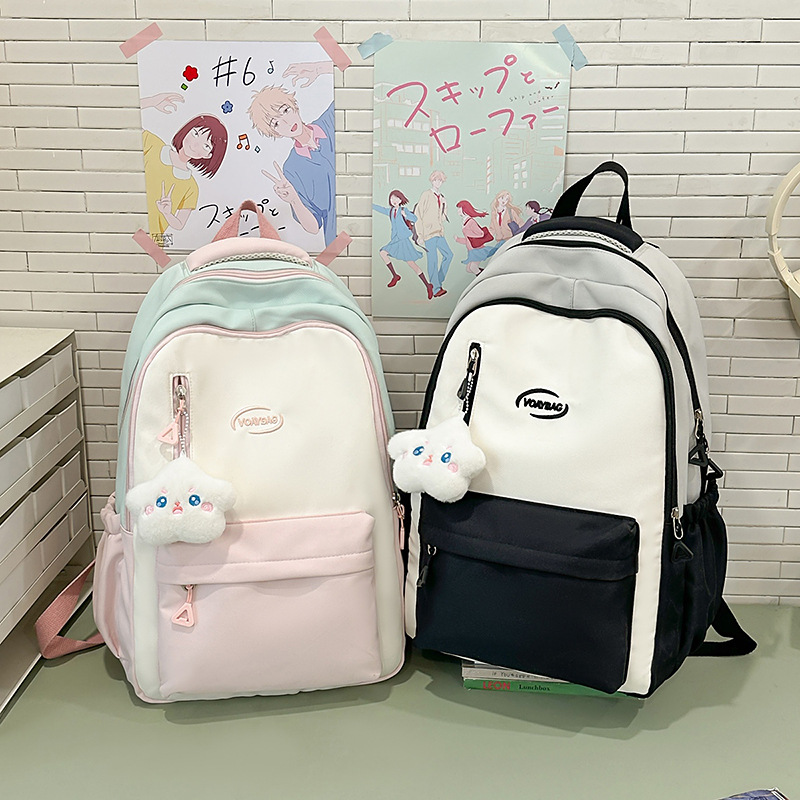 New Korean-style backpack for college students, large capacity, simple design, versatile backpack for junior high school students, and a high school girl bag full figure