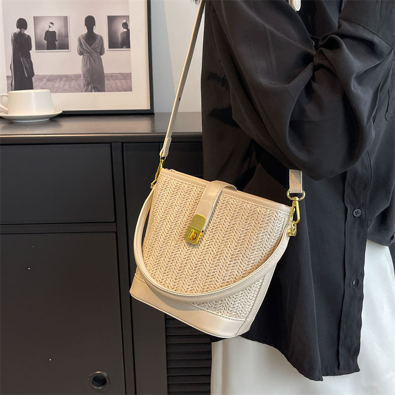 The 2024 new straw-woven bag for women is a trendy solid-color niche design crossbody bag and a versatile hand-held bucket bag Application Scenario
