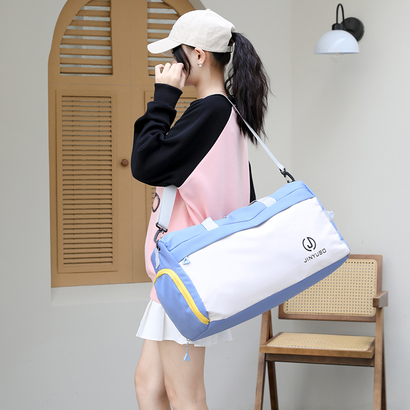 Wholesale new large-capacity women's handbags, light and casual, color-blocking short-distance dry and wet separation portable luggage storage bags full figure