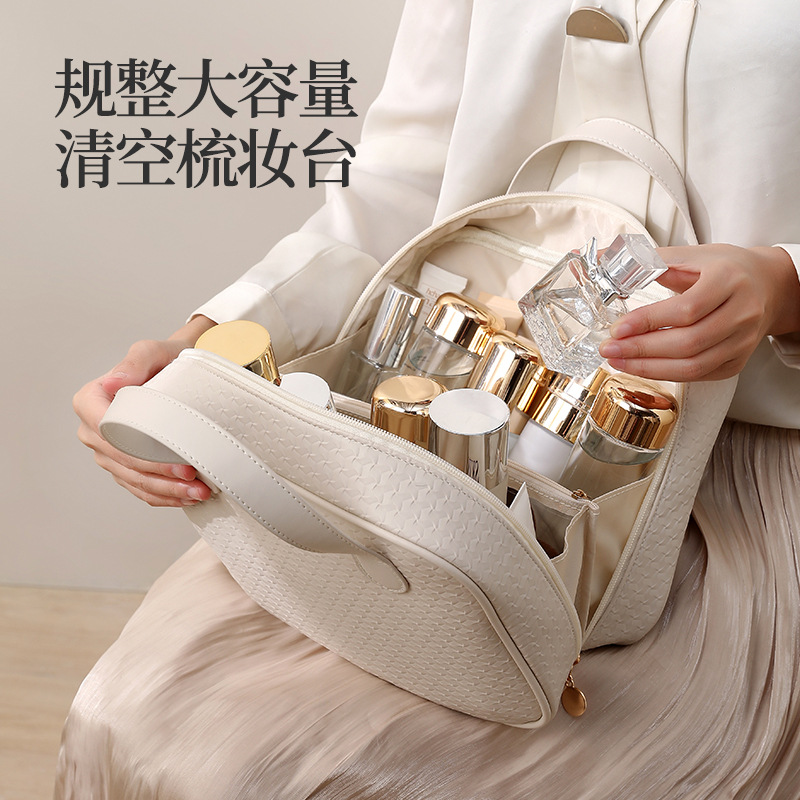 Thickened PU hand-held cosmetic bag, large capacity, high appearance level, waterproof storage bag, convenient for travel, large opening toiletry bag details Picture