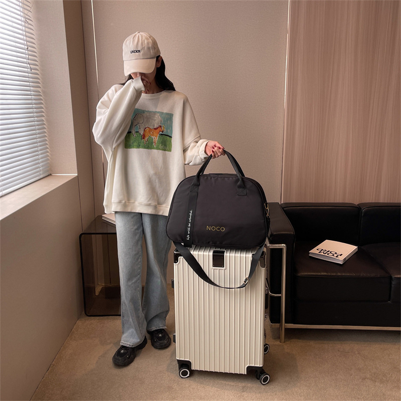 Travel bag trendy brand 2025 new luggage bags, commuter short-distance business trip bags, lightweight wholesale hand-held crossbody fitness bags details Picture