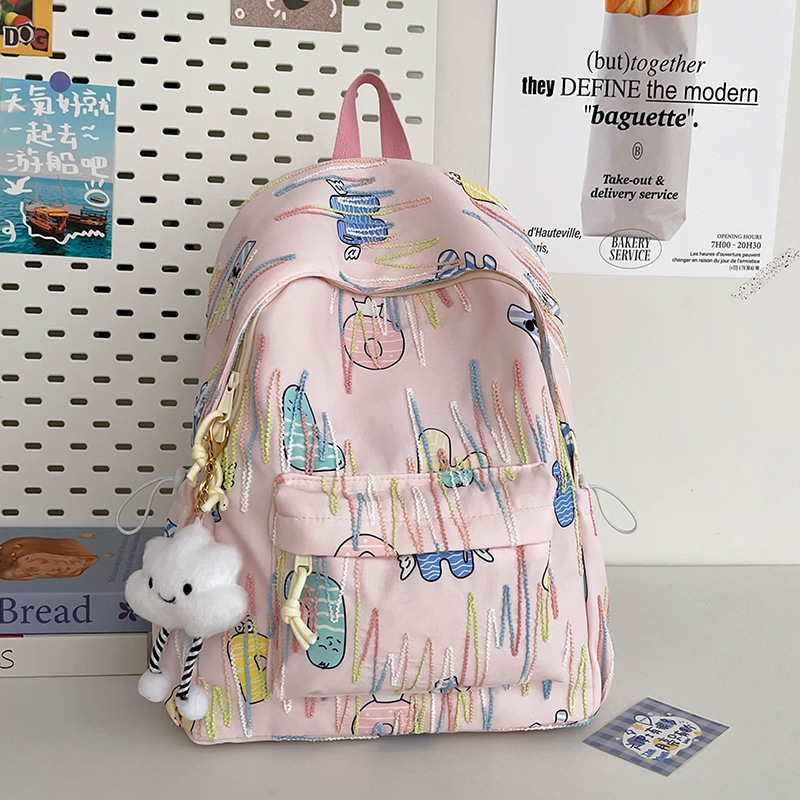 This is a high-appearance-level, large-capacity, ins style backpack for junior high school, senior high school and college students. It's a simple and cute campus backpack details Picture