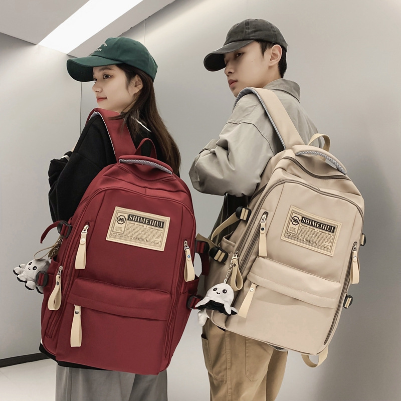 Junior high school backpack for both boys and girls, high appearance level, dirt-resistant casual travel bag, large-capacity computer bag full figure